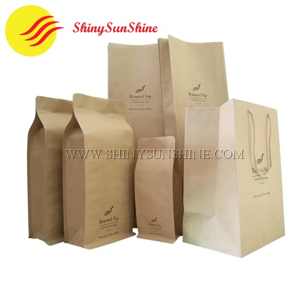 Custom Kraft paper gift bag with handles with logo design.