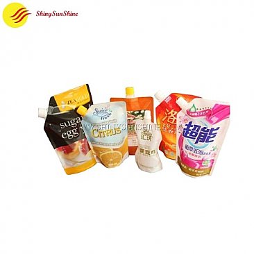 Custom standing spouted nozzle juice pouches, food grade material packaging bags.